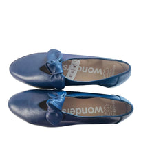 Load image into Gallery viewer, Pair of blue shoes with bows on a white surface
