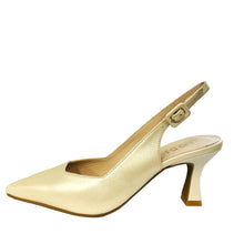 Load image into Gallery viewer, Beige high-heeled shoe on a white surface with a window in the background
