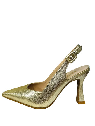 Gold high-heeled shoe on a white surface with a neutral background