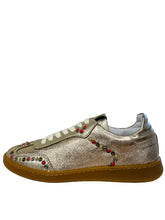 Load image into Gallery viewer, Metallic sneaker with red and gold studs on a white surface.
