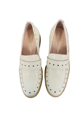 Load image into Gallery viewer, Pair of white loafers on a wooden surface with a tiled wall background
