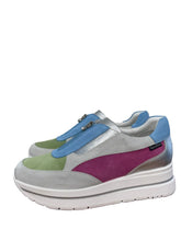 Load image into Gallery viewer, Colorful sneaker with a thick white sole on a wooden floor.
