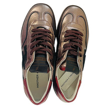 Load image into Gallery viewer, Pair of brown leather shoes on a white surface with wooden sides.
