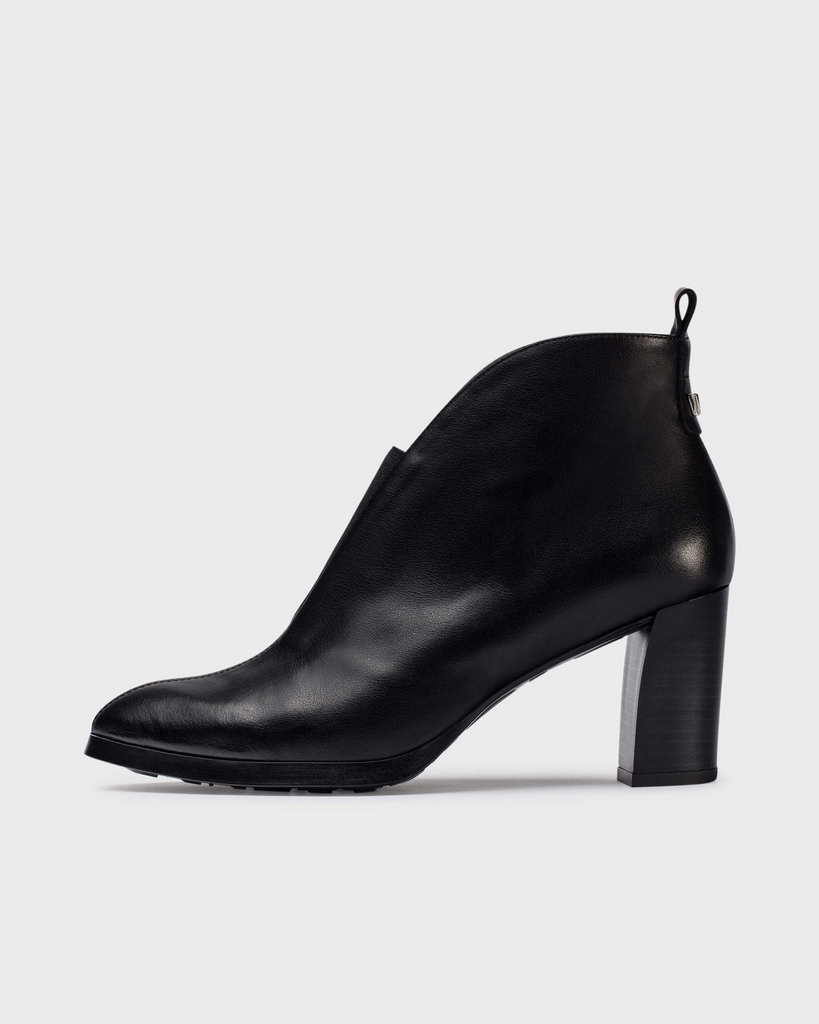 A black leather ankle boot with a chunky block heel, shown from a side profile view against a light gray background.