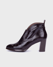 Load image into Gallery viewer, A single dark brown ankle boot with a glossy crocodile-embossed texture and a chunky block heel, shown from a side profile on a light gray background.
