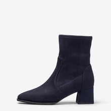 Load image into Gallery viewer, A single navy blue ankle boot with a block heel and pointed toe, shown in a side profile on a light gray background.
