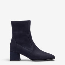 Load image into Gallery viewer, A single navy blue ankle boot with a block heel and pointed toe, shown in a side profile on a light gray background.

