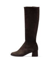 Load image into Gallery viewer, A dark brown suede knee-high boot with a block heel and rounded toe, shown in a side profile on a white background.
