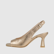 Load image into Gallery viewer, Gold high-heeled shoe on a light gray background
