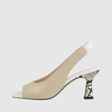 Load image into Gallery viewer, Beige high-heeled shoe with a decorative heel on a light gray background
