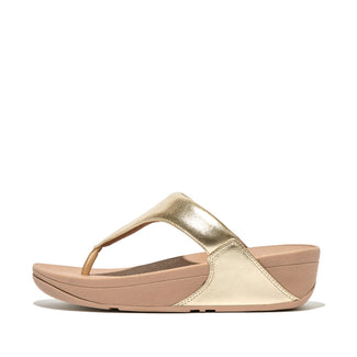 Gold and beige sandal on a white background