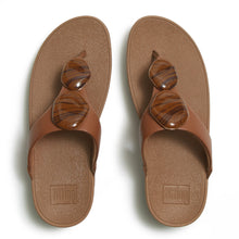 Load image into Gallery viewer, Pair of brown sandals with decorative elements on a white background
