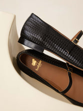 Load image into Gallery viewer, Black woven sandal on a beige background

