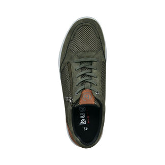 Green sneaker with brown accents on a white background