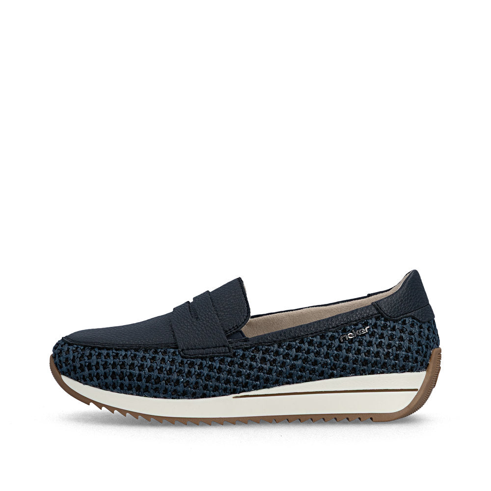 Navy slip-on shoe with textured sole on a white background