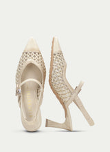 Load image into Gallery viewer, Pair of beige high-heeled shoes with detailed design on a light gray background
