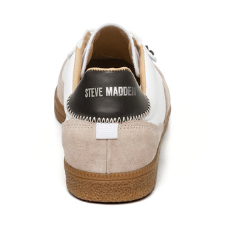 White sneaker with brown accents on a white background