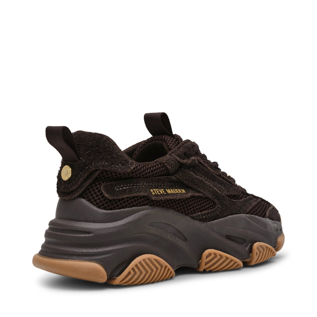 Brown sneaker with tan sole on a white background