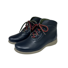 Load image into Gallery viewer, A pair of dark navy blue pebbled leather ankle boots with multicolor striped laces and a light gray sole, shown against a plain light gray background.
