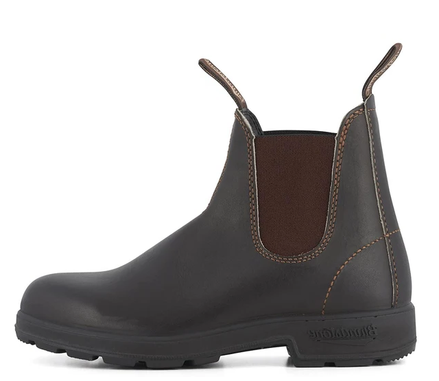 A dark brown leather Chelsea boot with contrast stitching, brown elastic side panels, and pull tabs, shown from a side profile on a white background. The brand 'Blundstone' is embossed on the heel.