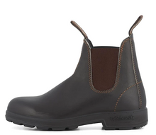 Load image into Gallery viewer, A dark brown leather Chelsea boot with contrast stitching, brown elastic side panels, and pull tabs, shown from a side profile on a white background. The brand 'Blundstone' is embossed on the heel.
