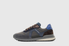 Load image into Gallery viewer, Gray and blue sneaker on a light gray background
