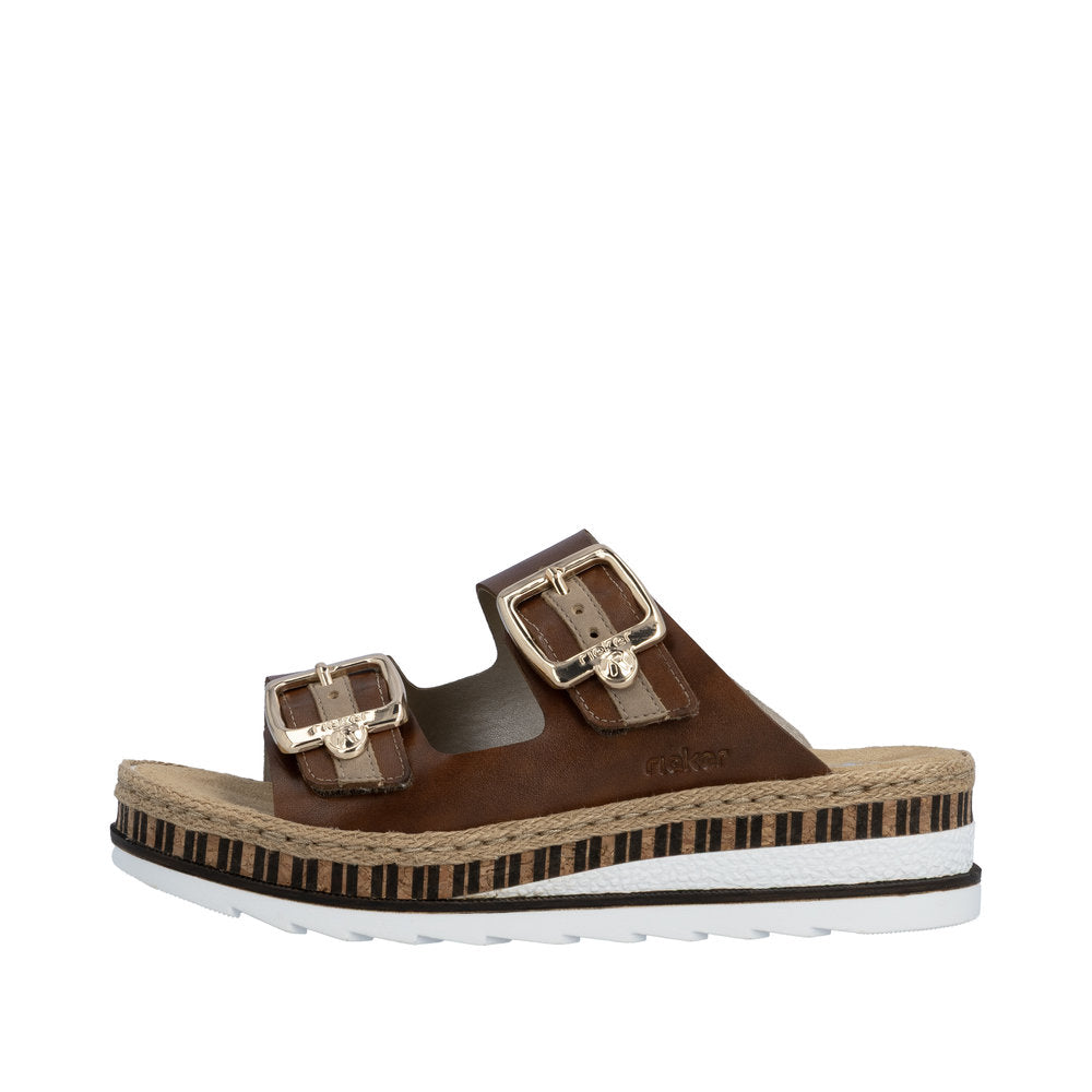 Brown sandal with two buckles on a white background
