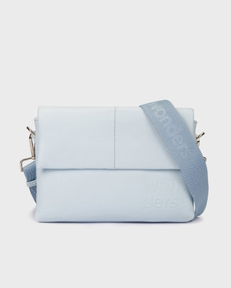 Light blue handbag with a strap on a white background