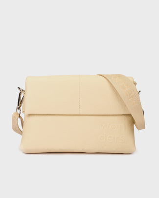 Beige handbag with a strap on a light gray background