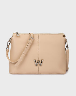 Beige handbag with a decorative 'W' on a light gray background