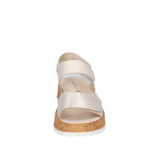White sandal with cork platform on a white background