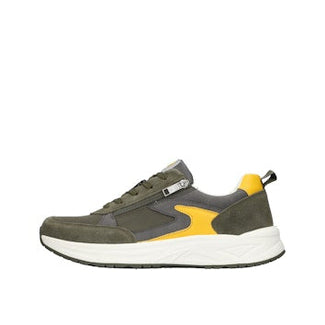 Sneaker with green, gray, and yellow design on a white background