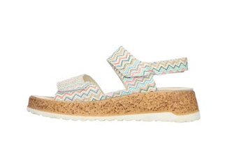 Cork sandal with a colorful zigzag strap on a white background