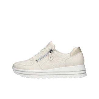White sneaker with a zipper on a white background