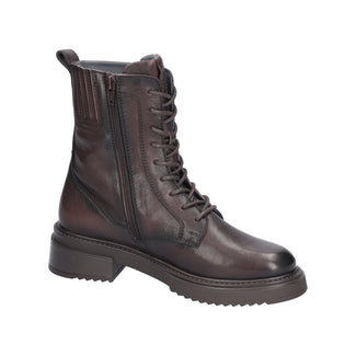 Brown leather boot on a white background