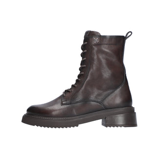 Brown leather boot on a white background
