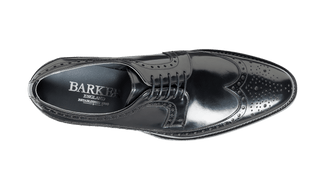 Black dress shoe on a transparent background