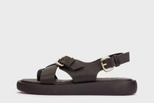 Load image into Gallery viewer, Black sandal with gold buckle on a white background
