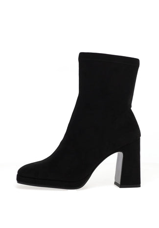 Black ankle boot with a block heel on a white background