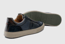 Load image into Gallery viewer, Navy blue sneaker with beige sole on a light gray background
