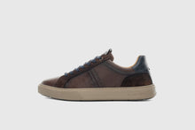 Load image into Gallery viewer, Brown sneaker with beige sole on a light gray background
