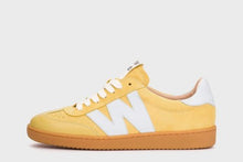 Load image into Gallery viewer, Yellow sneaker with white accents on a light gray background
