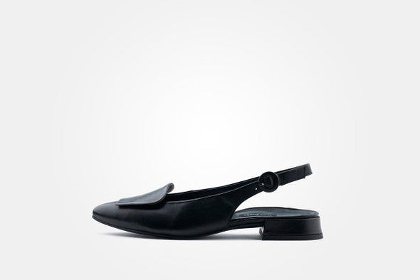 Black slingback shoe on a white background