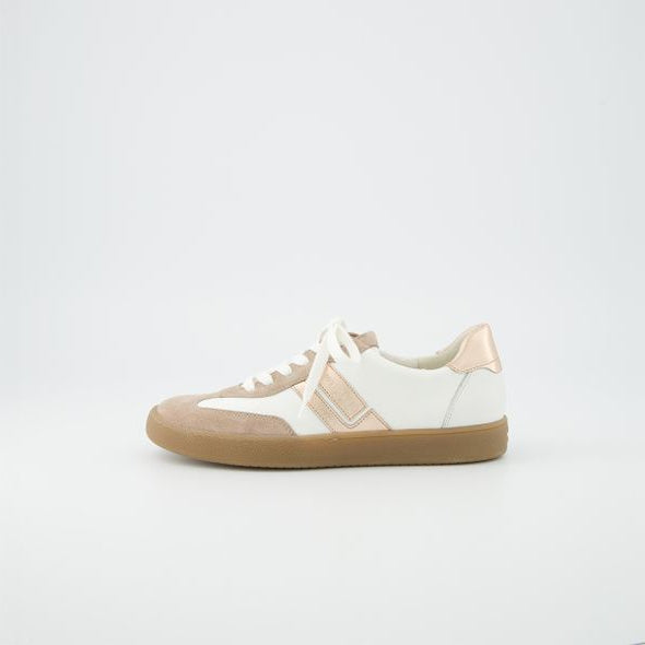 White and beige sneaker with a light brown sole on a white background