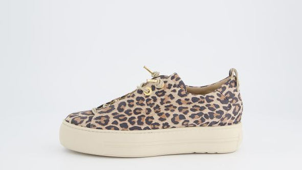 Sneaker with leopard print pattern on a white background
