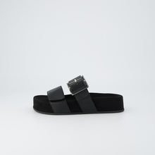 Load image into Gallery viewer, Black sandal with a buckle on a light gray background

