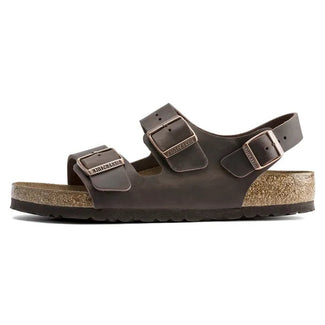 Brown sandal with cork sole on a white background