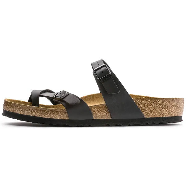 Black sandal with cork sole on a white background