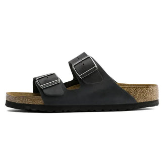 Black sandal with cork insole on a white background