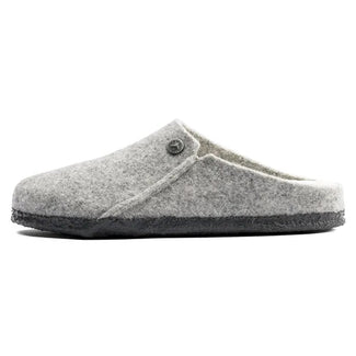 Gray felted wool slippers with a button on a white background